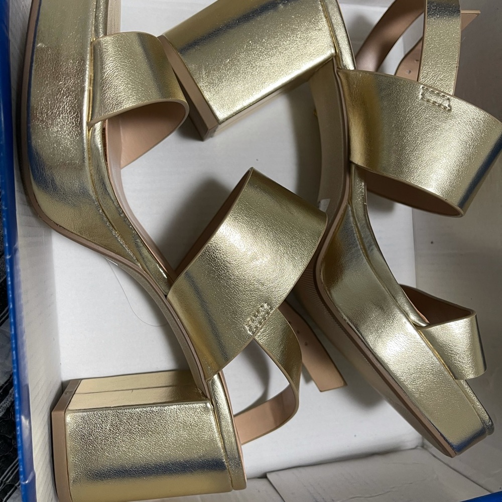 Very nice plataform sandals, gold color 7.5 brand new for $35.00 .